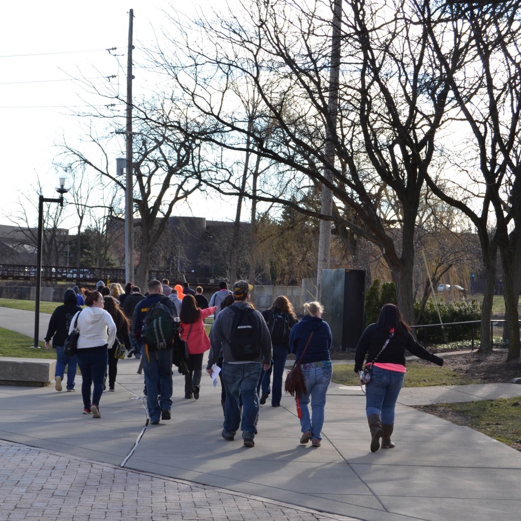Bendle High School students cross campus to sessions focused on understanding the Flint water crisis.