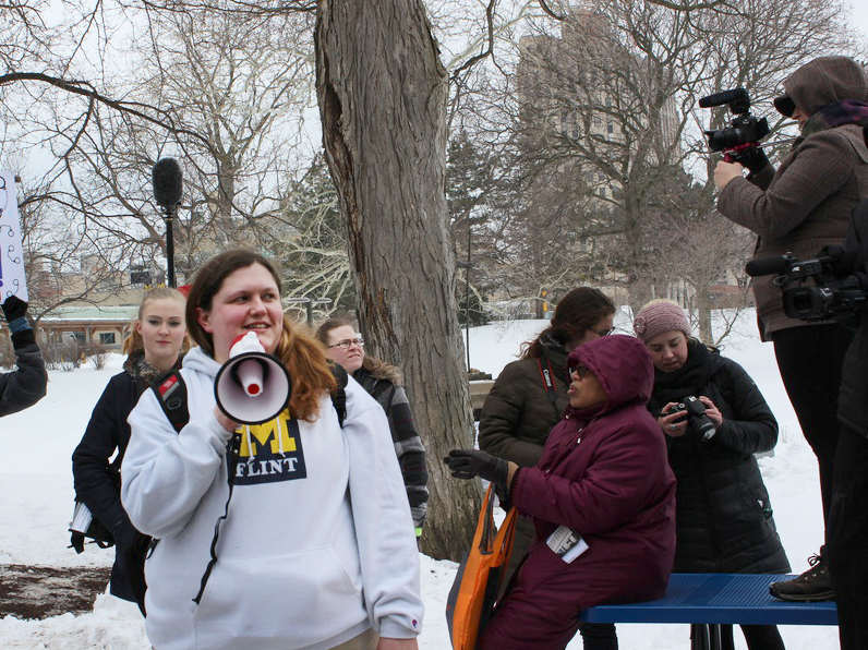 Tiffany Williams speaks to rally members and media during her #Justice4Flint demonstration.