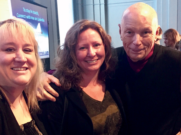 Katherine Eaton (left) and student Nancy Lareau pose with astronaut Story Musgrave