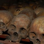 Skulls of victims from the Rwandan Genocide found at the Nyamata Memorial.   By The Dilly Lama and used under Creative Commons license.  