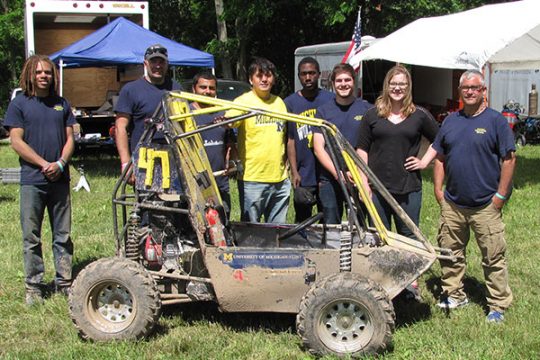 UM-Flint engineering students and faculty with their off-road racer