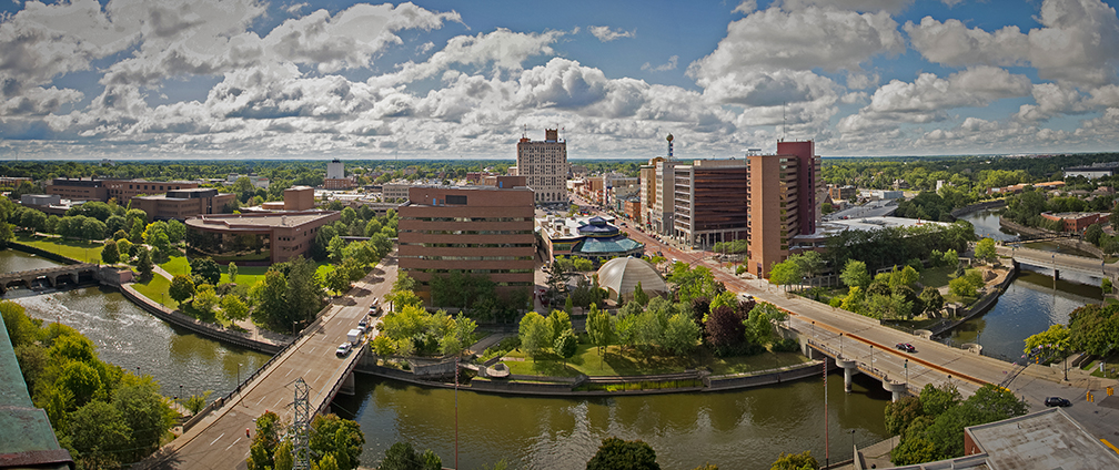 Downtown Flint with sunny blue skies and clouds.